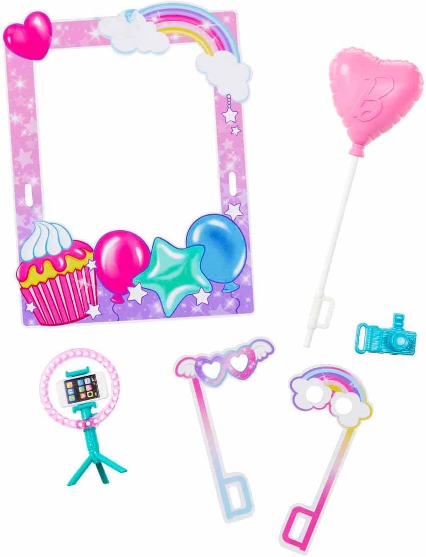 Set of colorful photo props including a frame, balloons, and accessories on a white background